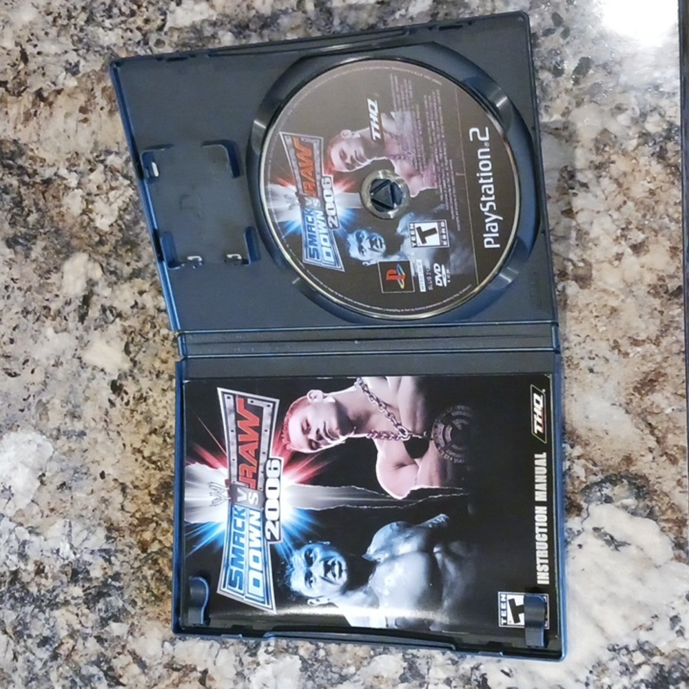 PlayStation 2 Smack Down Vs Raw 2006 - Picture 3 of 6